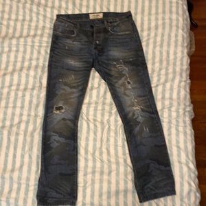 Chip foster camo printed distressed jeans